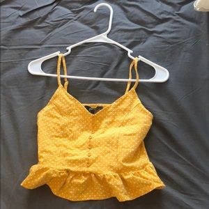 Yellow polka dot ruffle crop tank
